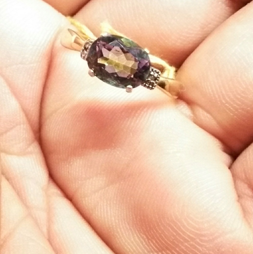 Beautiful rainbow topaz ring